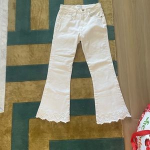 White frame jeans